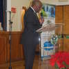 Pastor Gabriel welcomes the guests and members to the inaugural service