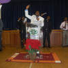 Rev.  Joe Olaiya leading a worship session